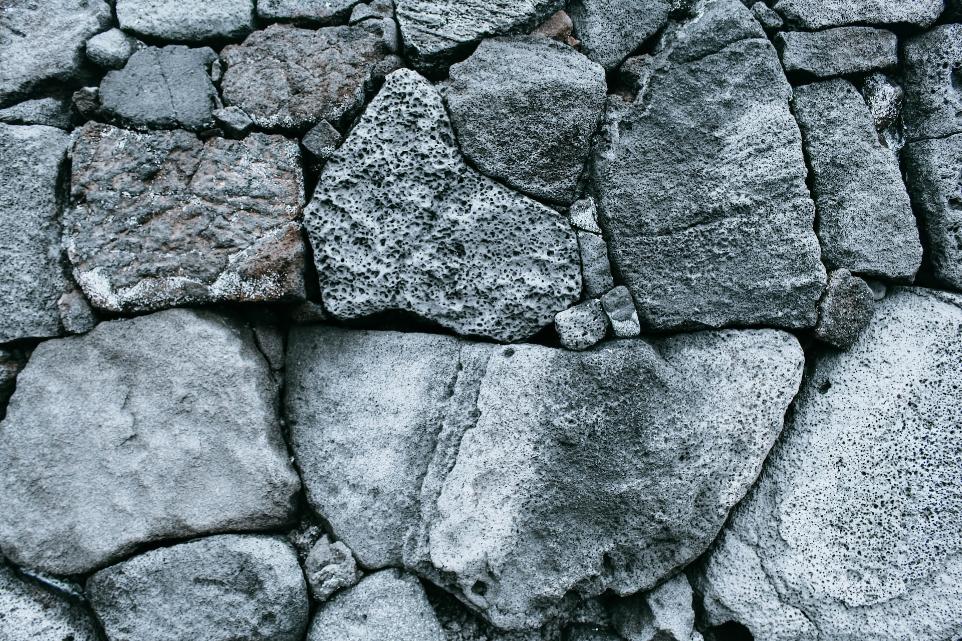 a close up of a rock wall made of rocks